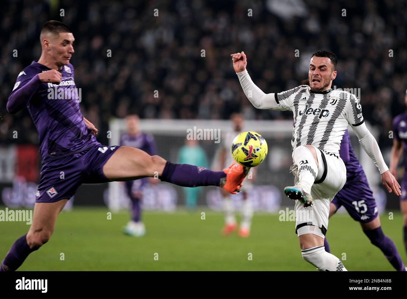 Florence, Italy. 21st May, 2022. Moise Kean of Juventus FC and Nikola  Milenkovic of ACF Fiorentina compete for the ball during the Serie A  2021/2022 football match between ACF Fiorentina and Juventus