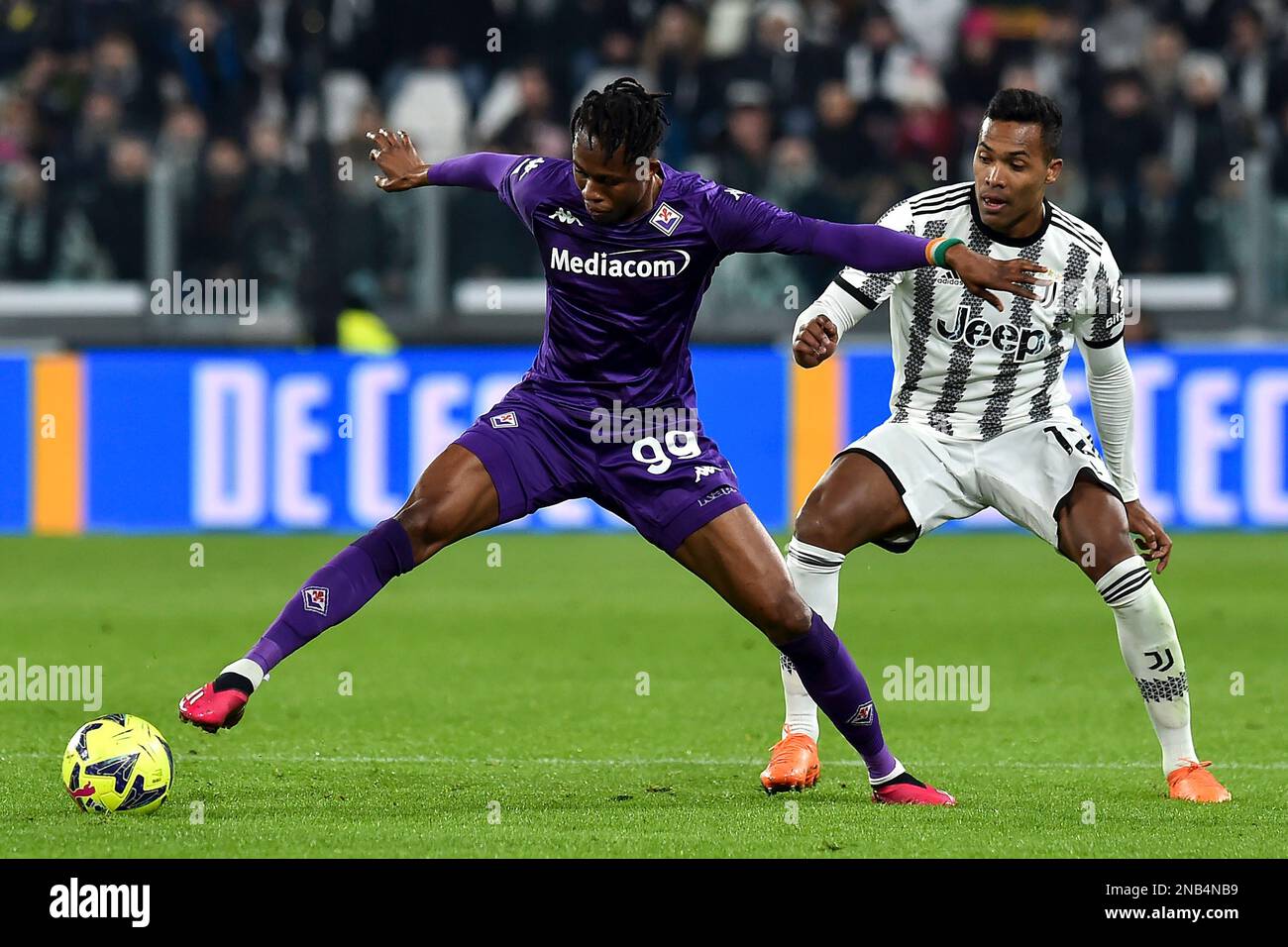 Christian Kouame of ACF Fiorentina and Alex Sandro of Juventus FC compete  for the ball during the Serie A football match between Juventus FC and ACF  Stock Photo - Alamy