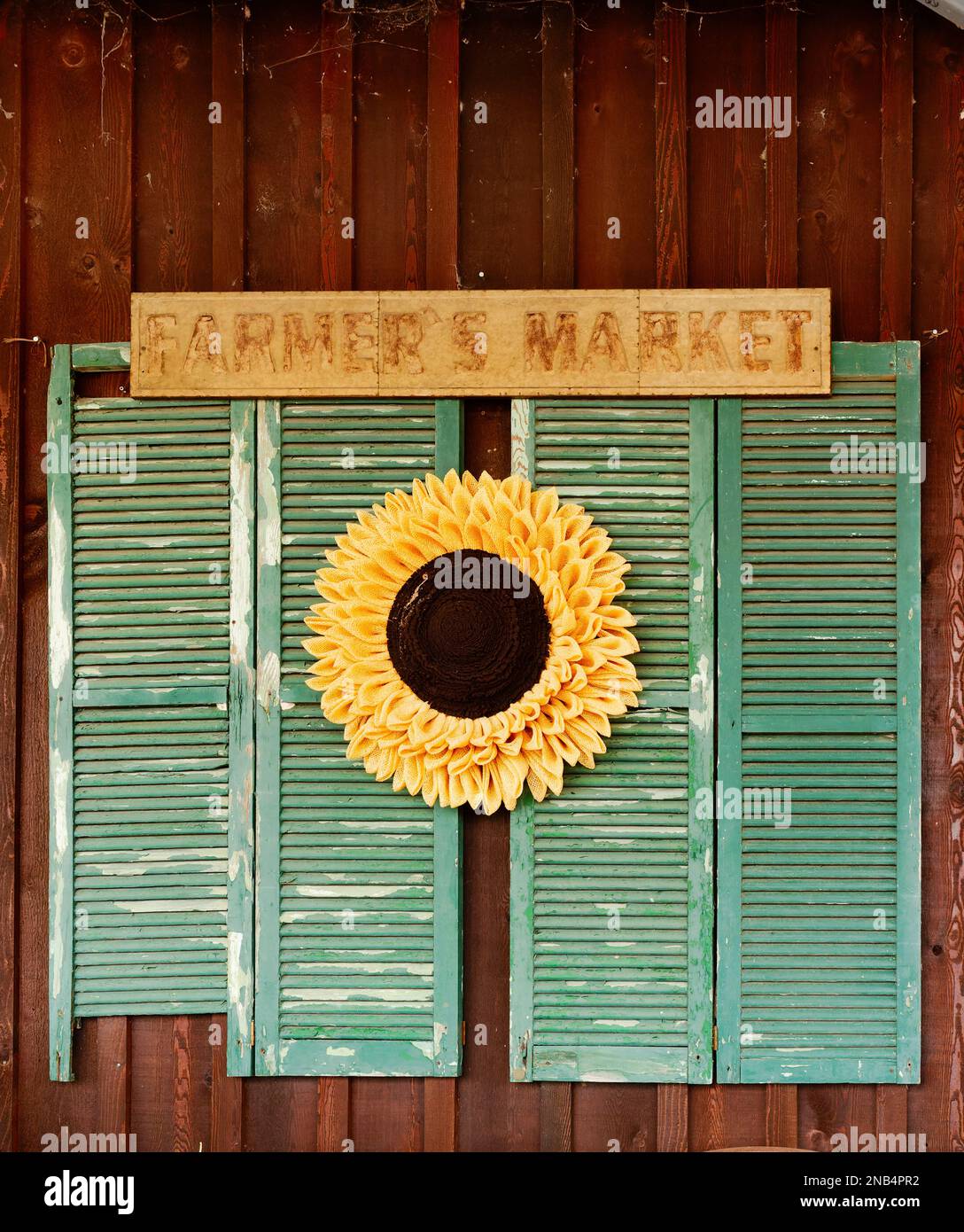 Farmer's Market advertising or marketing sign or signage on side of roadside country market in Pike Road Alabama, USA. Stock Photo