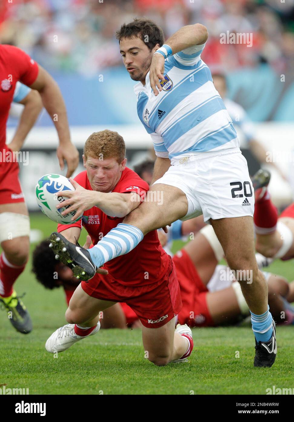 Argentina's Alfredo Lalanne attempts to kick the ball away from a