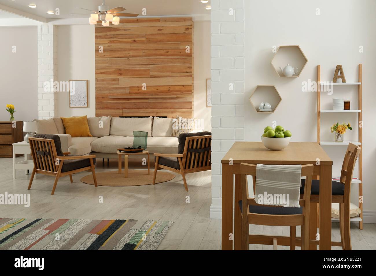 Stylish sofa in living room. Interior design Stock Photo - Alamy