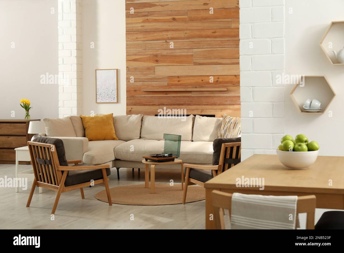 Stylish sofa in living room. Interior design Stock Photo - Alamy