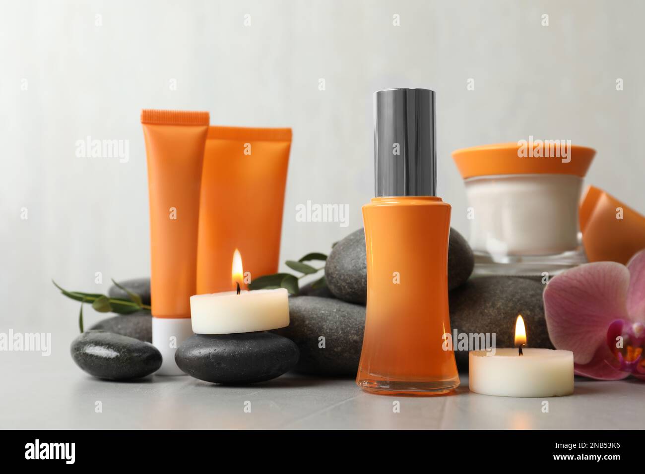 Composition with cosmetic products on light grey stone table Stock ...