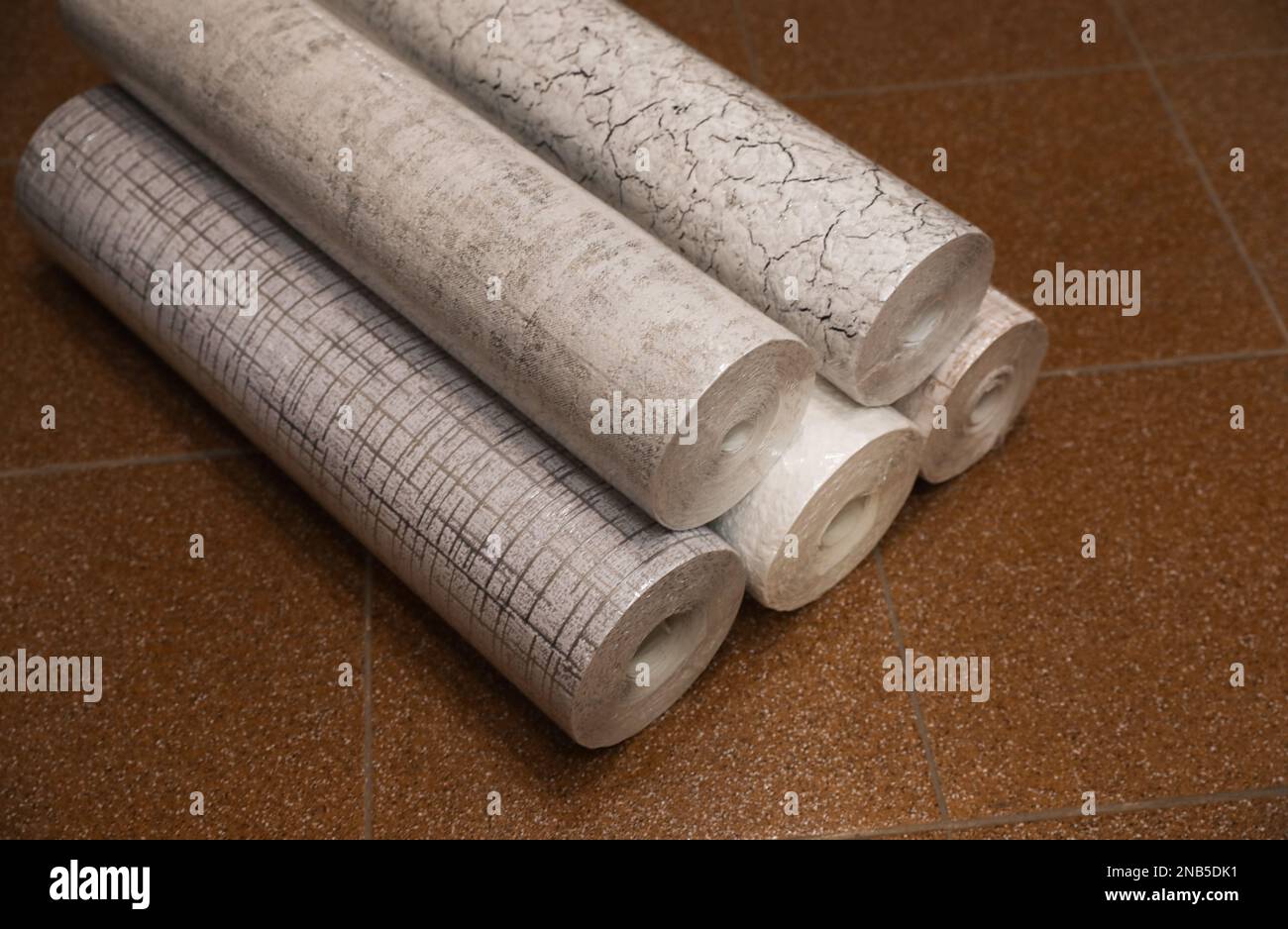 Different rolls of wallpaper isolated on white background with clipping  path Stock Photo - Alamy