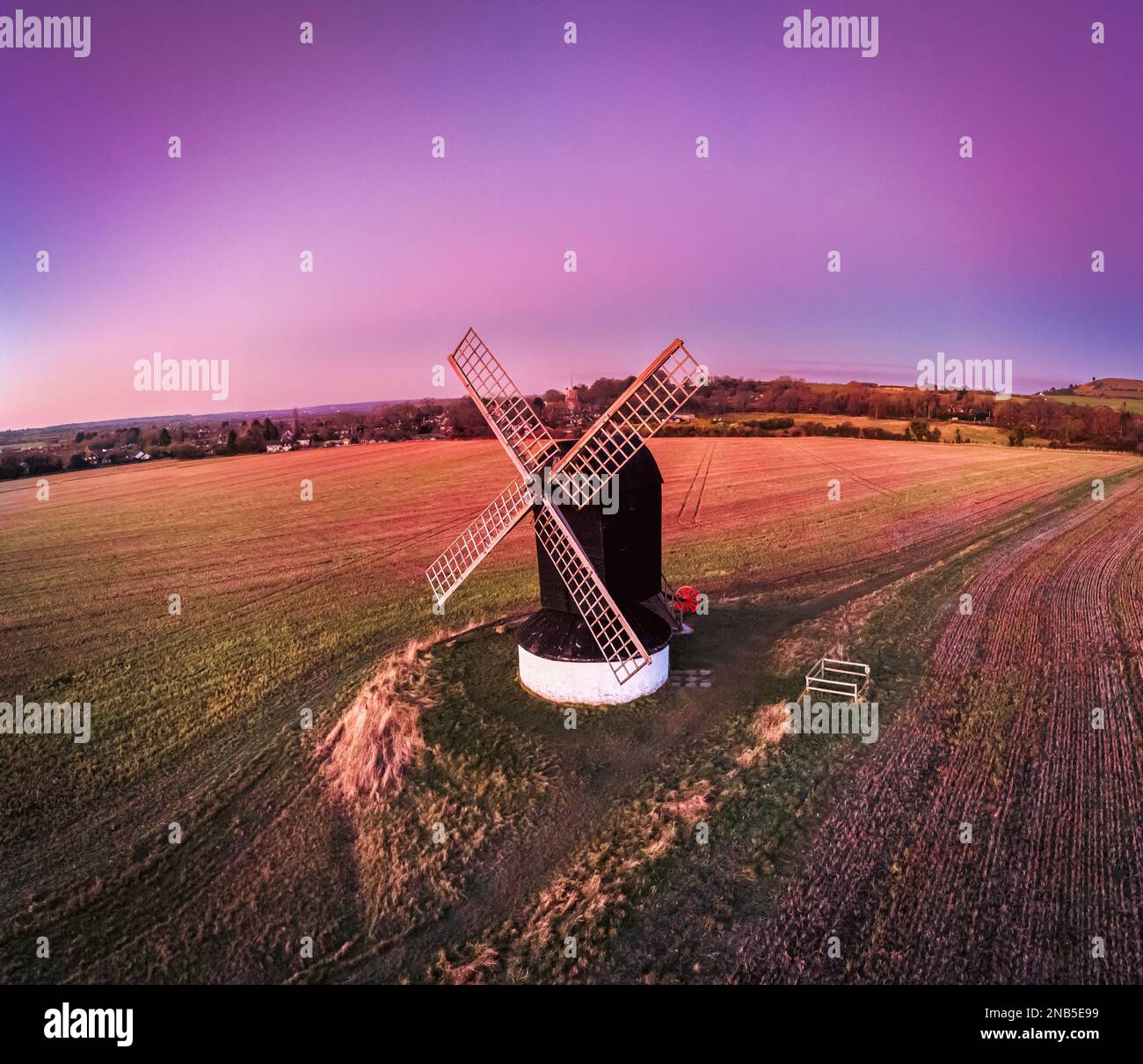 A beautiful view of the Pitstone Windmill in England during sunset Stock Photo
