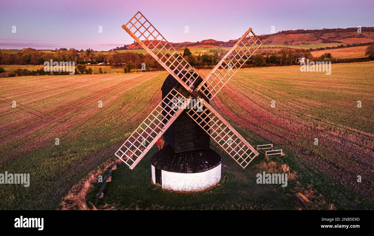 A beautiful view of the Pitstone Windmill in England during sunset Stock Photo