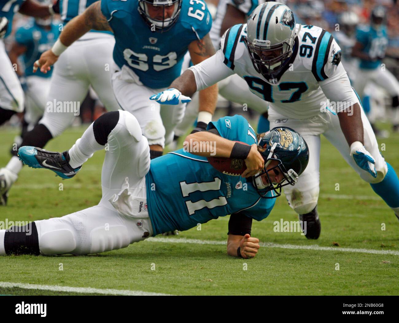 Pittsburgh Steelers' Leonard Pope (45) gets wrapped up by Carolina  Panthers' Thomas Keiser (98), Terrell McClain (97), and R.J. Stanford (25)  during the first half of their pre-season game on Thursday, August