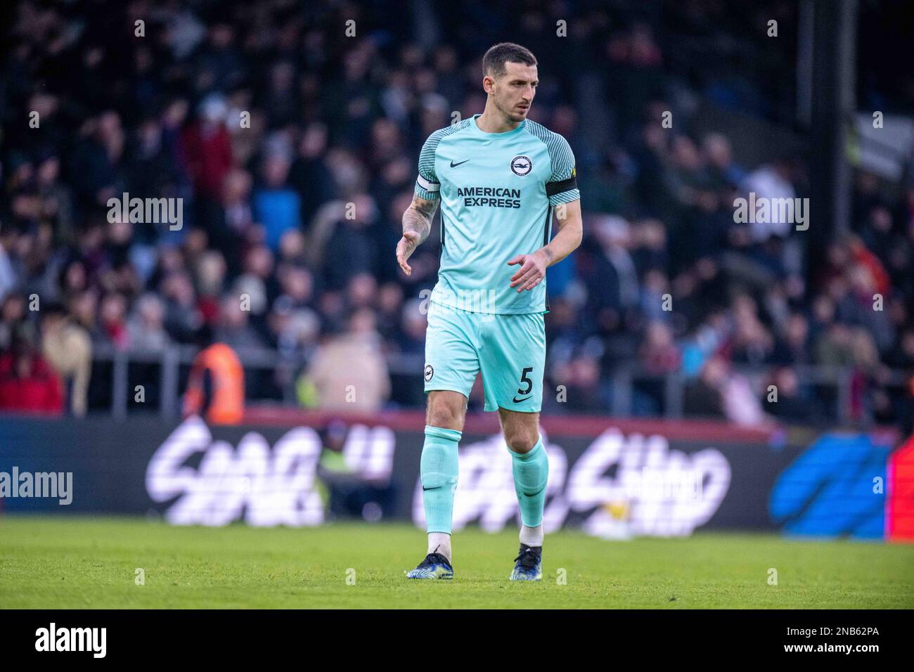 LONDON, ENGLAND - FEBRUARY 11: Lewis Dunk of Brighton & Hove Albion during the Premier League match between Crystal Palace and Brighton & Hove Albion Stock Photo