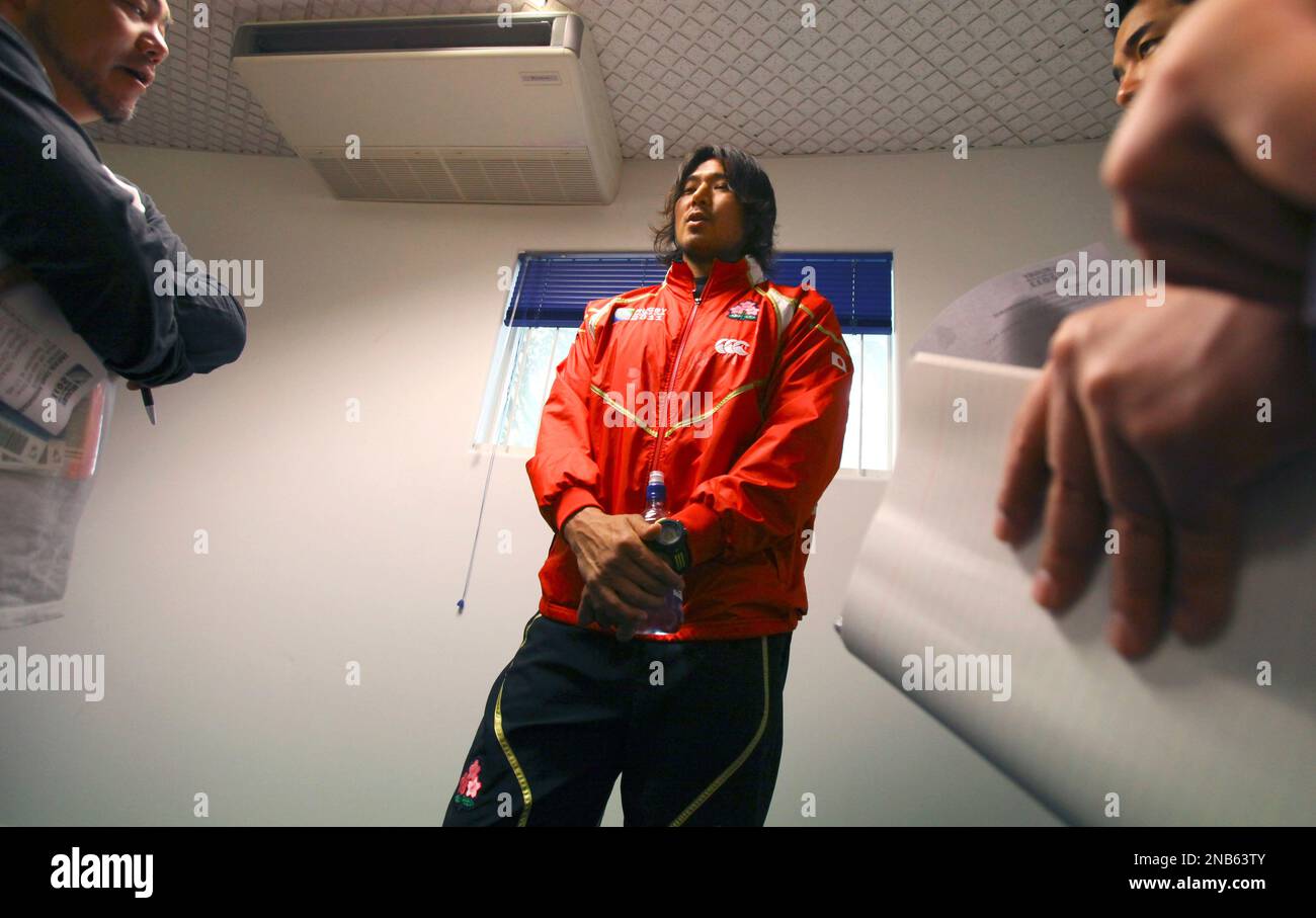 Japan's rugby player Kosuke Endo speaks to reporters during a press