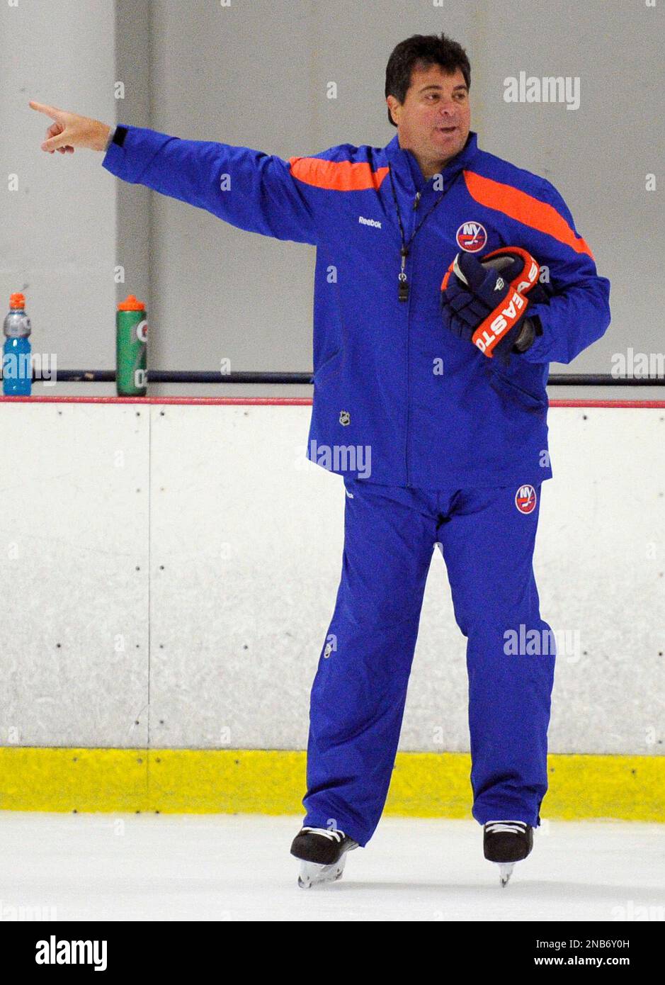 New York Islanders coach Jack Capuano gives directions during the NHL