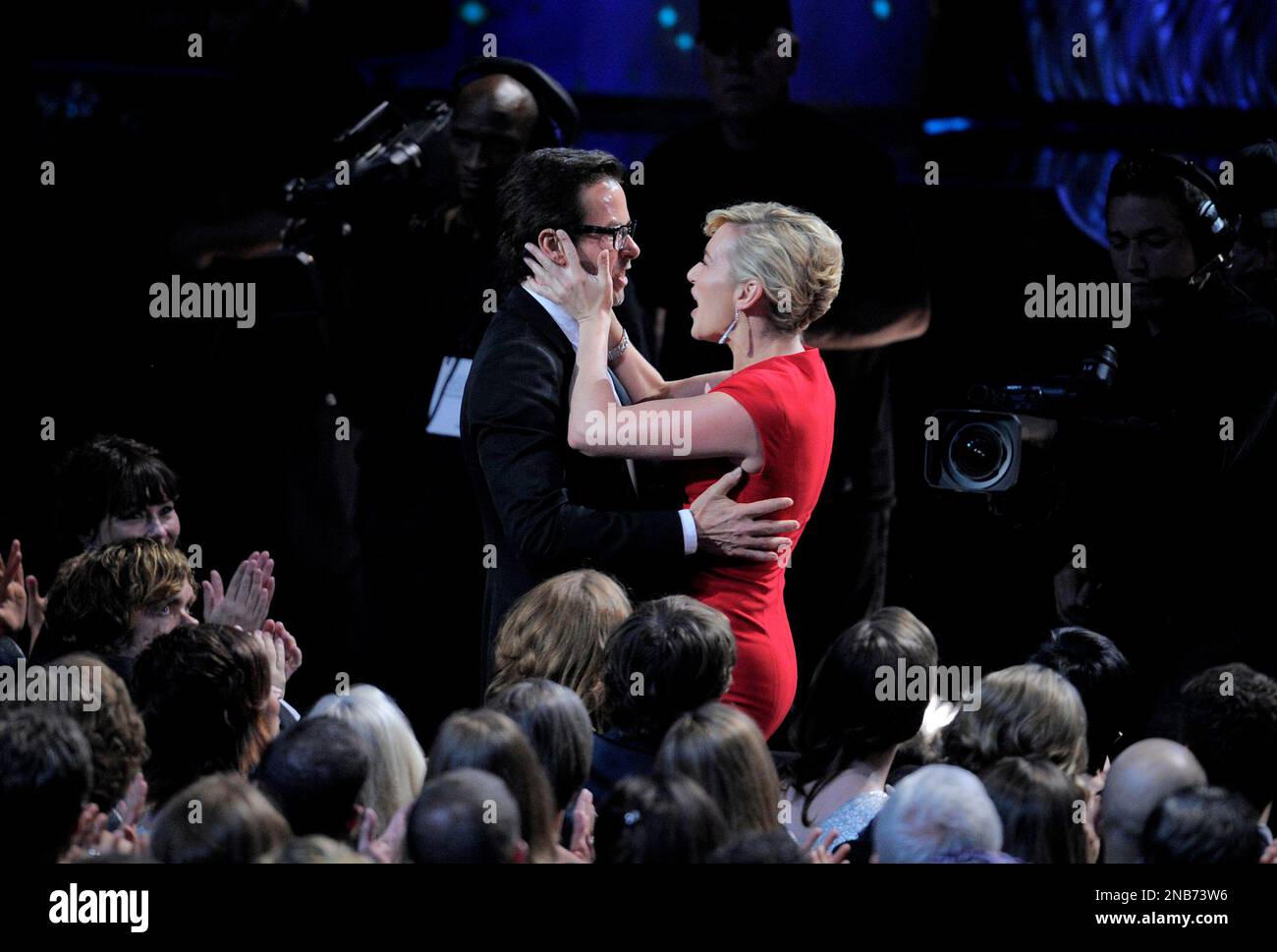Guy Pearce, left, is seen with costar Kate Winslet before accepting the