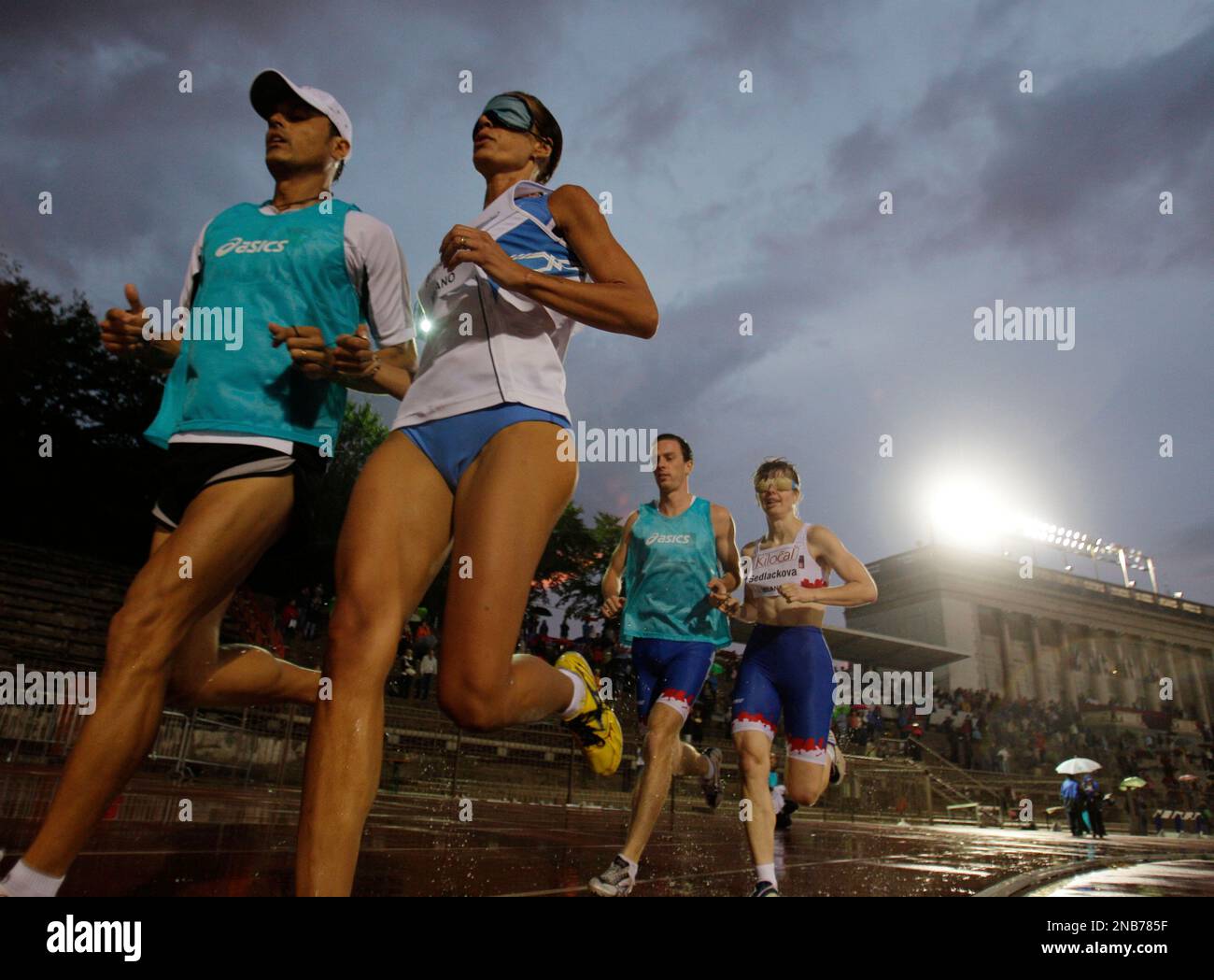 Italian runner and singer Annalisa Minetti, center, competes in the ...
