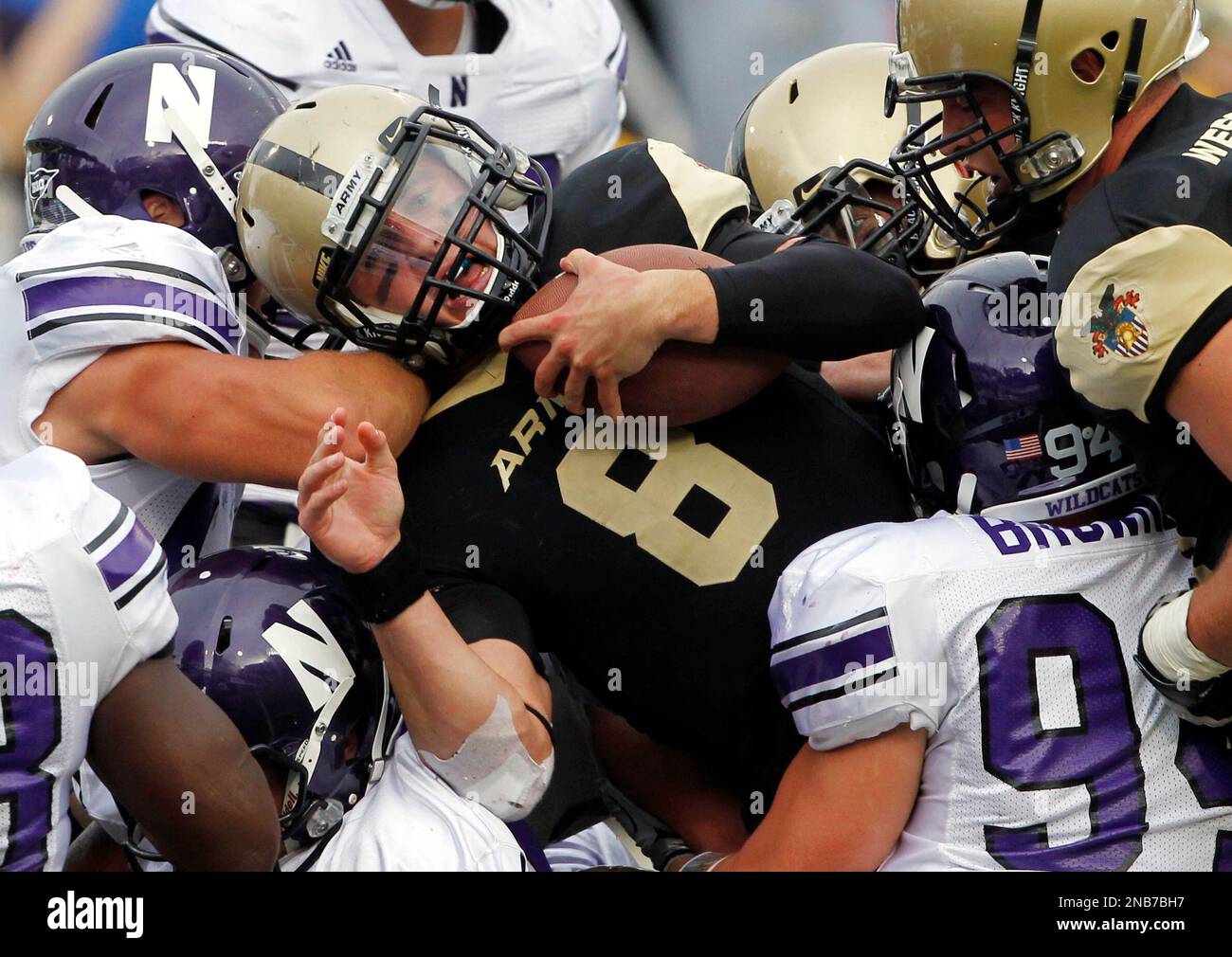 Army quarterback Trent Steelman (8) scores a touchdown against