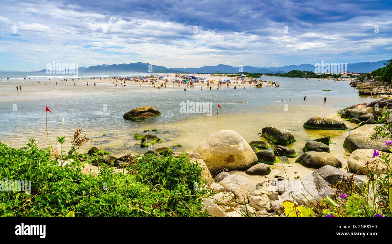 Guarda do Embau, January 14, 2022: Rio da Madre separating Praia Guarda do Embau beach from the mainland Stock Photo