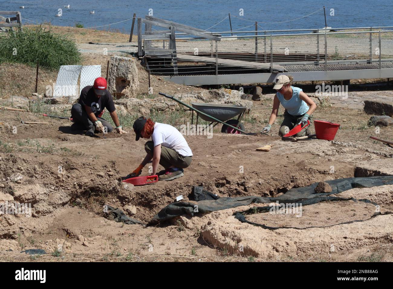 Archaeologists and students from the University of Padova, excavate for artifacts at the site of the Ancient City of Nora, in Sardinia, September 2022 Stock Photo