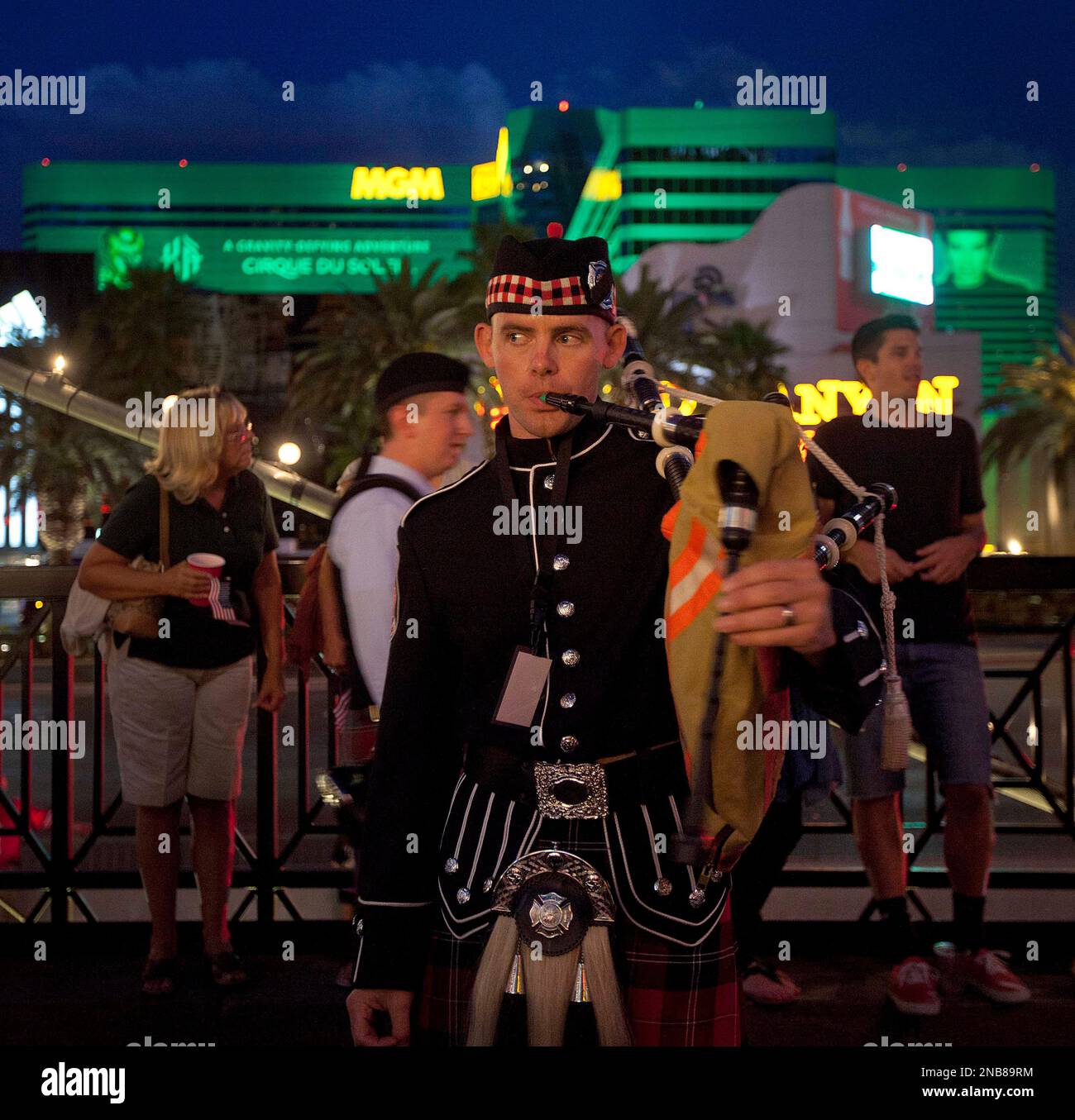 A bagpipe player from the Las Vegas Fire Department prepares to play in