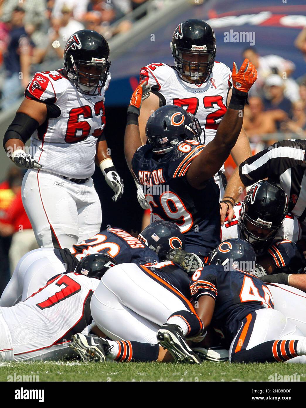Chicago Bears defensive lineman Henry Melton (69) celebrates a turnover by  the Atlanta Falcons in the