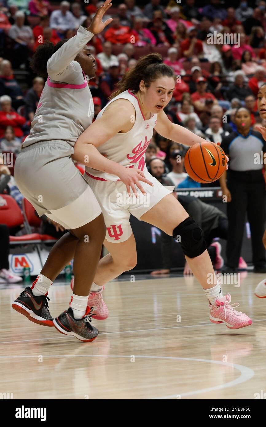 Indiana's Mackenzie Holmes, right, drives past Ohio State's Eboni