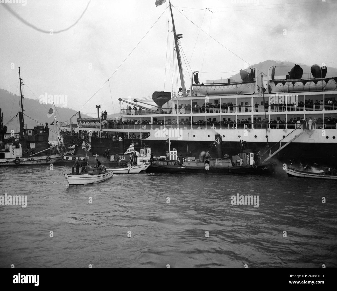 The Koan Maru steams into Maizuru Bay with its load of Japanese