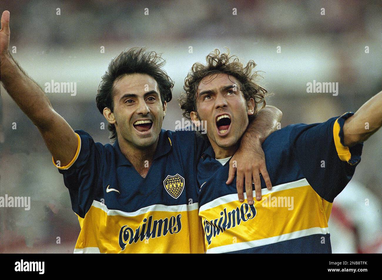 Boca Junior s Sergio Martinez right from Uruguay celebrates with teammate Diego Latorre after scoring against River Plate in Buenos Aires Argentina March 23 1997. AP Photo Eduardo Di Baia Stock Photo ...
