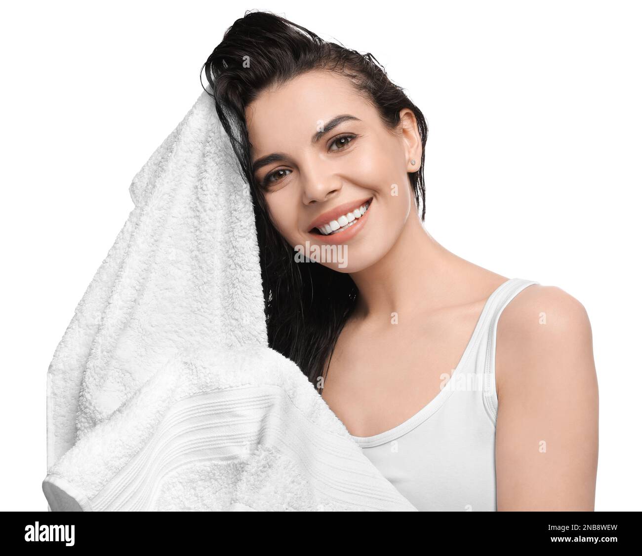 Happy young woman drying hair with towel after washing on white background Stock Photo Alamy