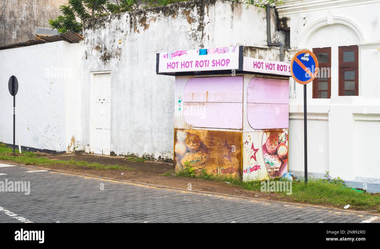 small street food shope at the side of the road,before it open aat the morning. galle fort, sri lanka. Stock Photo
