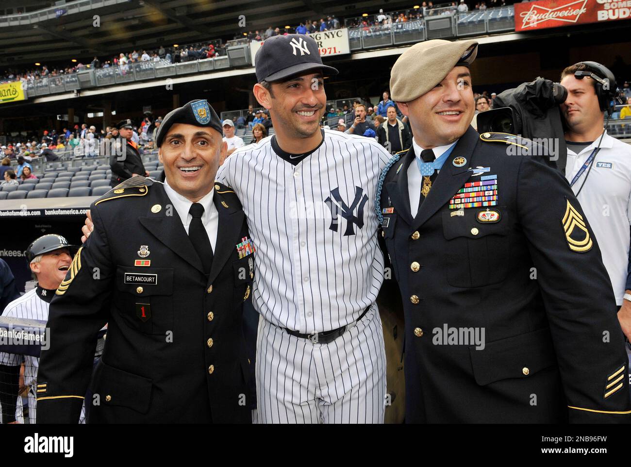 Congressional Medal of Honor awardee Sgt. 1st Class Leroy Arthur Petry  during ceremonies to honor the 10-year anniversary of September 11, 2001  before the baseball game between the Yankees and the Baltimore