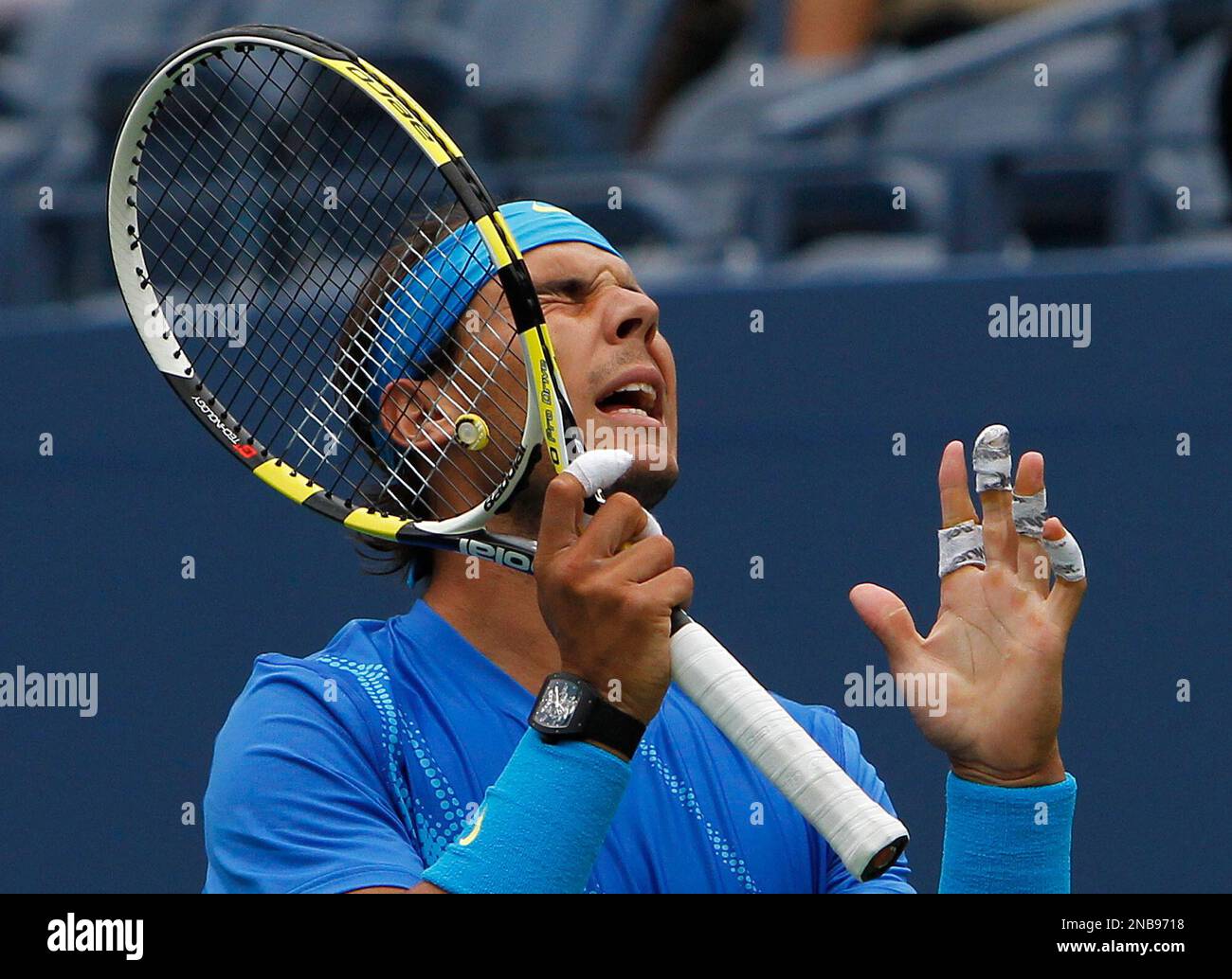 Rafael Nadal of Spain reacts during his match against Gilles Muller of  Luxembourg during the U.S. Open tennis tournament in New York, Wednesday,  Sept. 7, 2011. (AP Photo/Mike Groll Stock Photo - Alamy