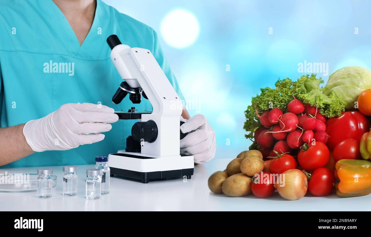 Quality control specialist inspecting food in laboratory, closeup