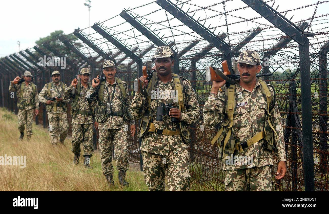 Indian Border Security Force soldiers patrol at Champakgachh village, on the  India-Bangladesh border, about 12 kilometers (7 miles) from Siliguri,  India, Tuesday, Sept. 6, 2011. Indian Prime Minister Manmohan Singh began a