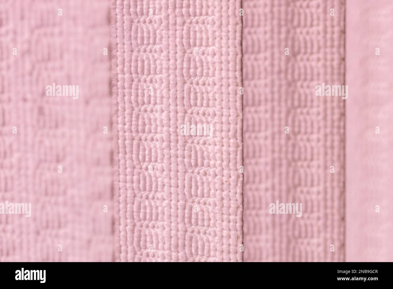 Defocused macro abstract texture background of a fabric vertical blinds surface in a rose pink color Stock Photo