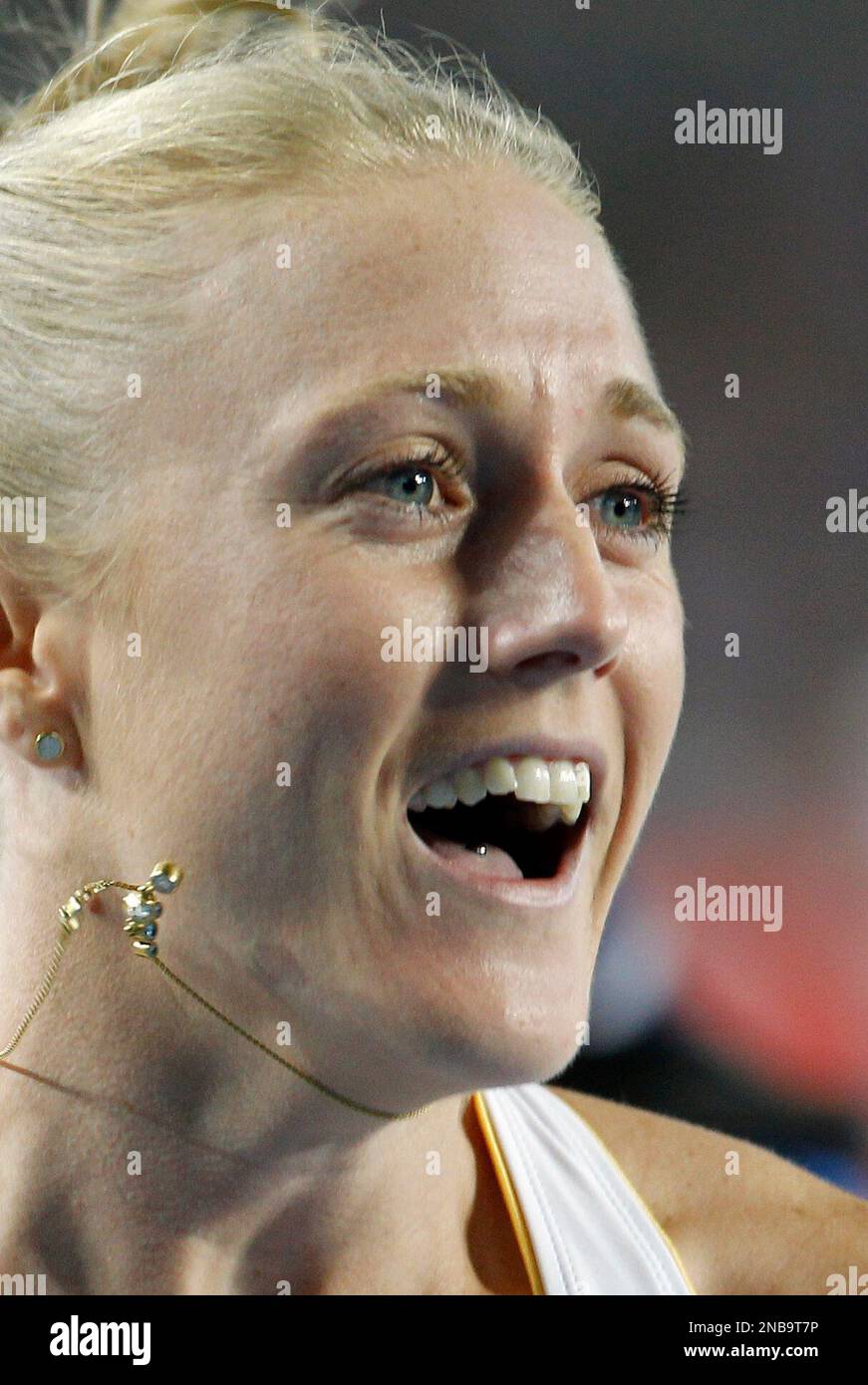 Australia's Sally Pearson reacts as she wins the Women's 100m Hurdles