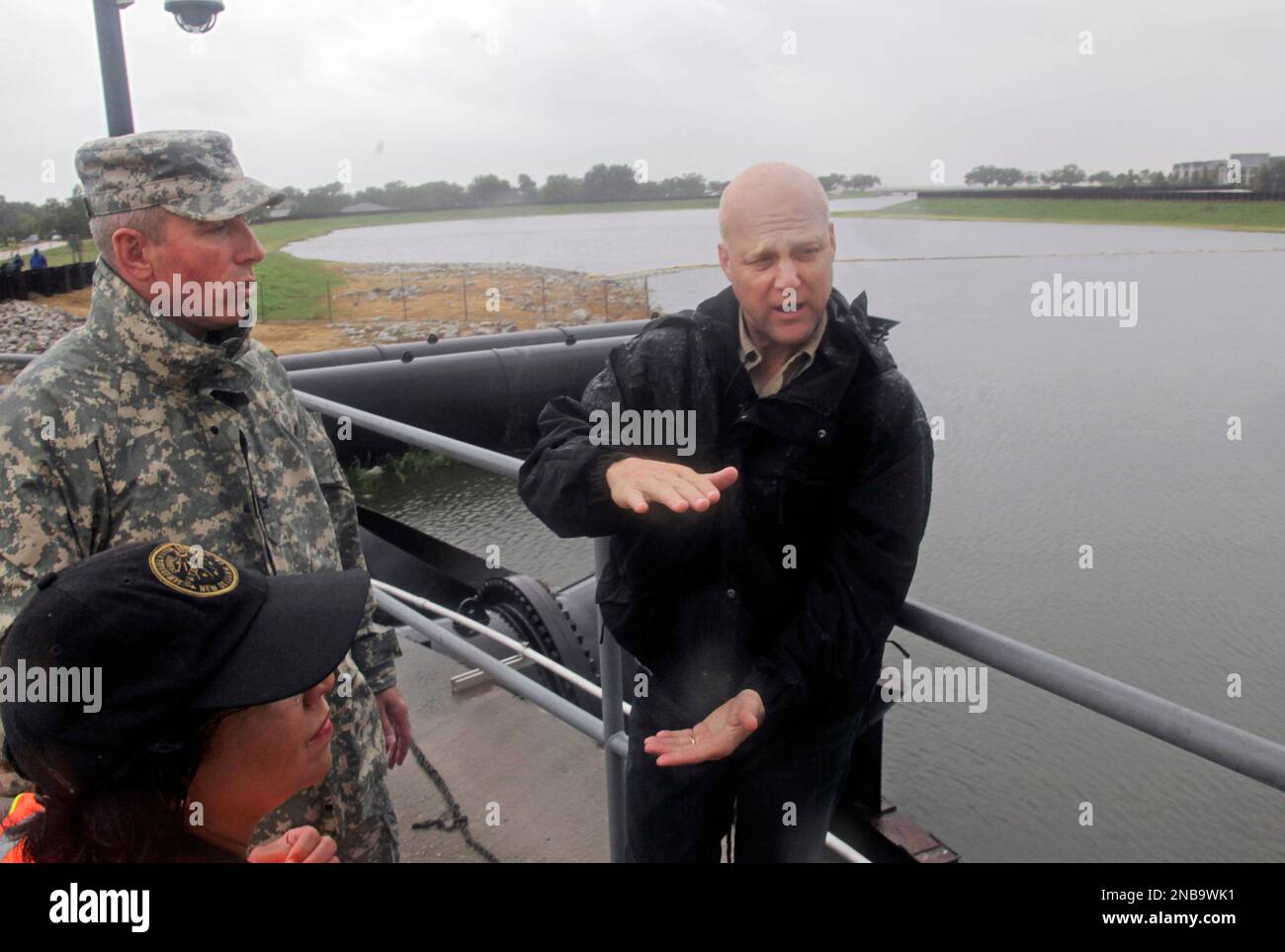 New Orleans Mayor Mitch Landrieu, right, talks with Col. Ed Fleming ...