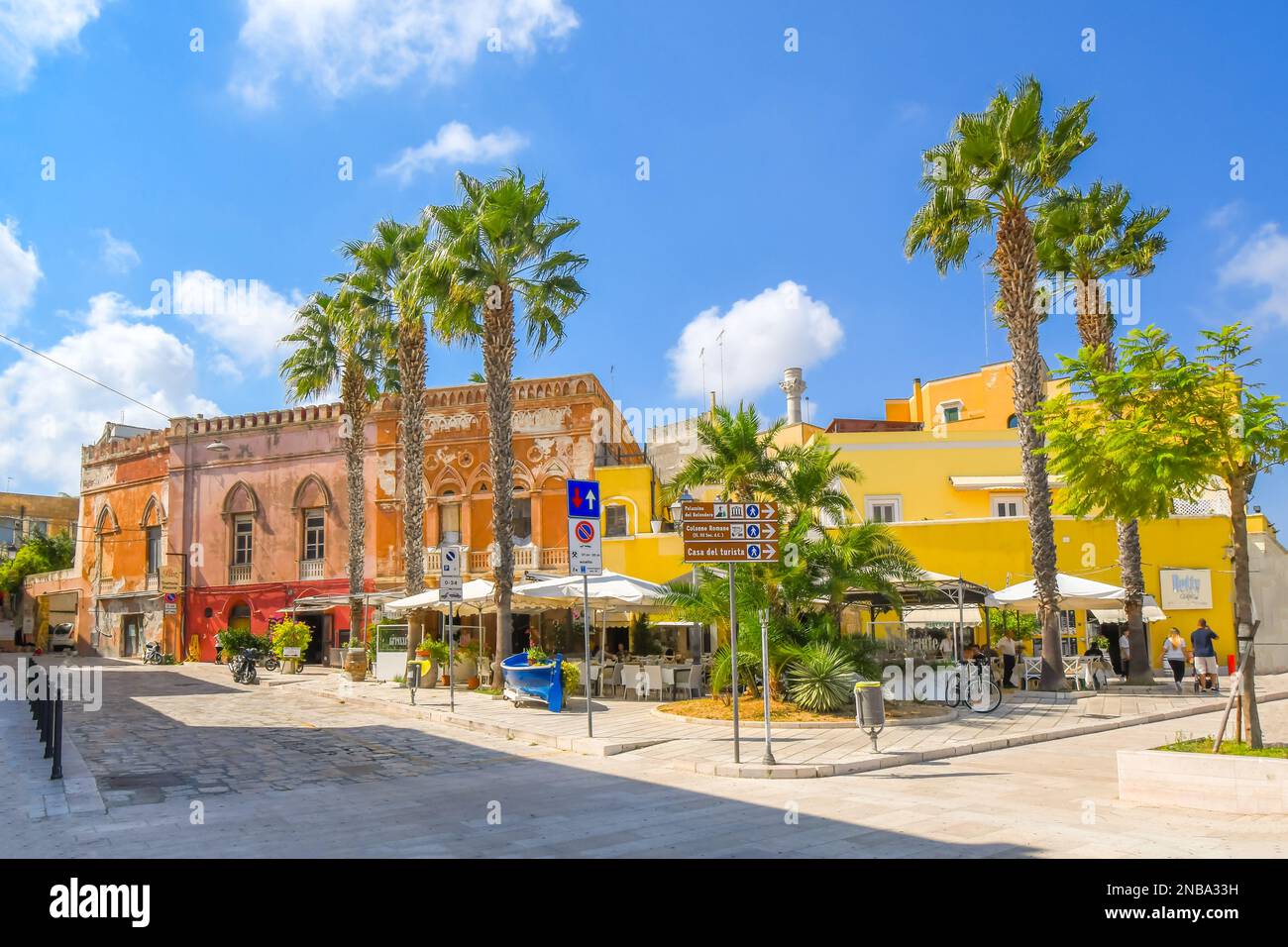 A sidewalk cafe with covered patio at the seaside promenade and boardwalk in the city of Brindisi, Italy, in the Puglia region. Stock Photo