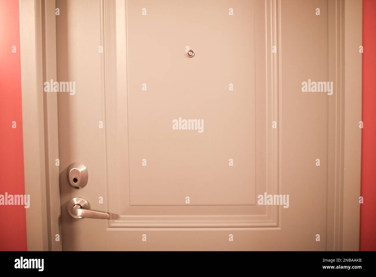modern metal Door handle and keyhole doorknob Stock Photo - Alamy