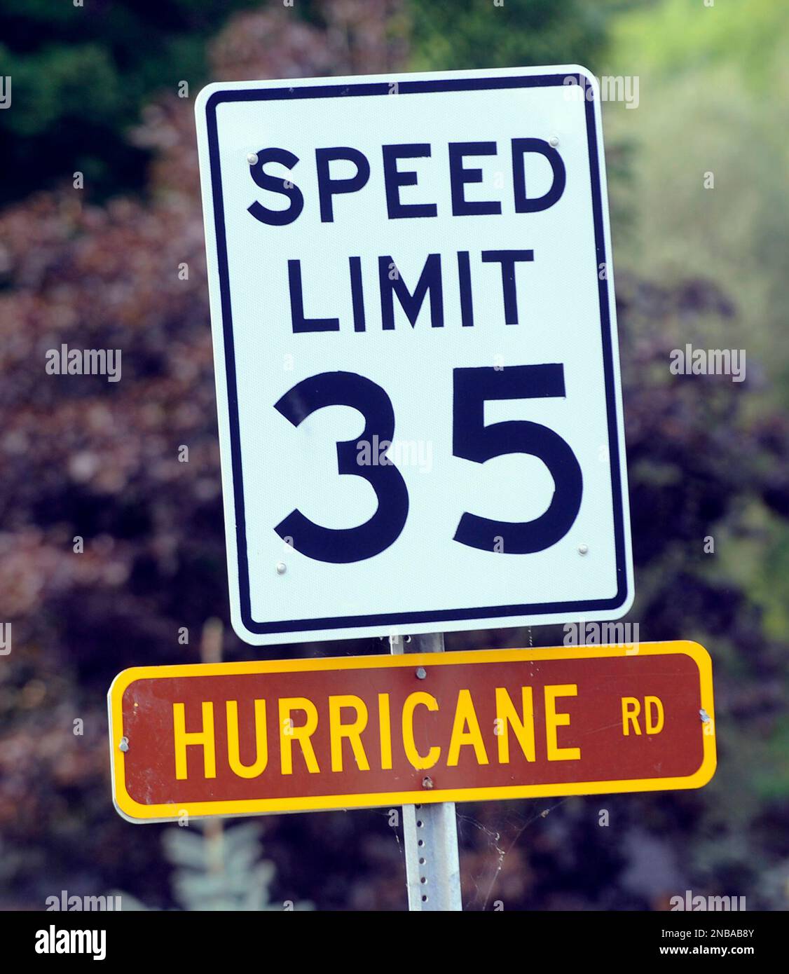 View of street sign named Hurricane Rd in the Town of Keene damaged by Tropical Storm Irene in