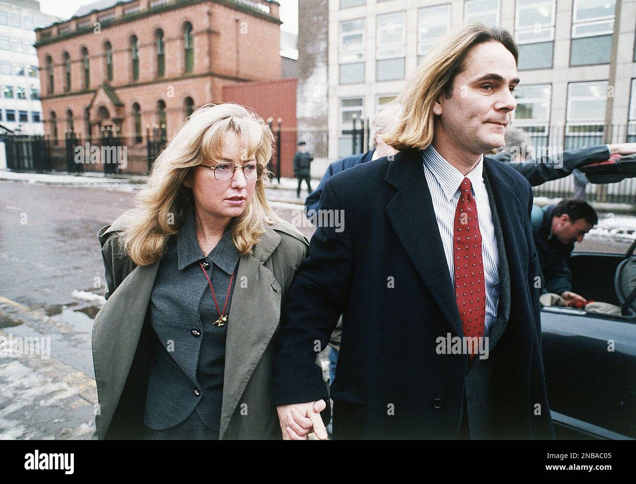 Paul Hill, 39, arrives with his wife, Courtney, 37, at the second day 