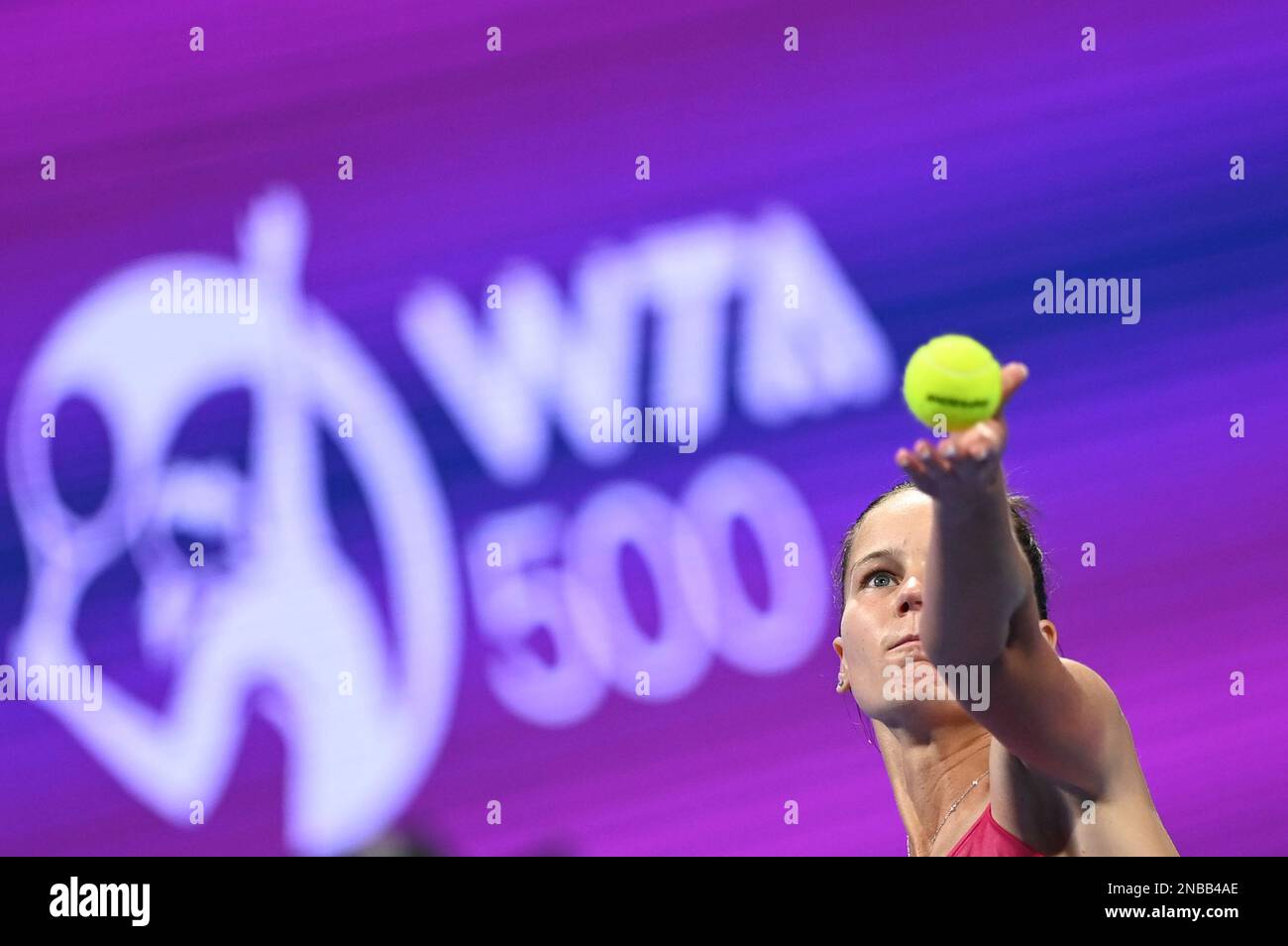 Doha, Qatar. 13th Feb, 2023. Veronika Kudermetova of Russia serves during the singles round of 32 match against Barbora Krejcikova of the Czech Republic at WTA500 Qatar Open 2023 in Doha, Qatar, Feb. 13, 2023. Credit: Nikku/Xinhua/Alamy Live News Stock Photo