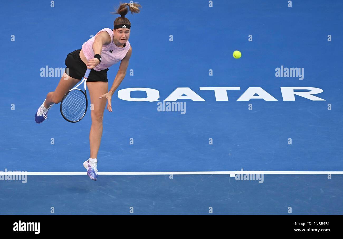 Doha, Qatar. 13th Feb, 2023. Karol¨ªna Muchova of the Czech Republic serves during the singles round of 32 match against Martina Trevisan of Italy at WTA500 Qatar Open 2023 in Doha, Qatar, Feb. 13, 2023. Credit: Nikku/Xinhua/Alamy Live News Stock Photo