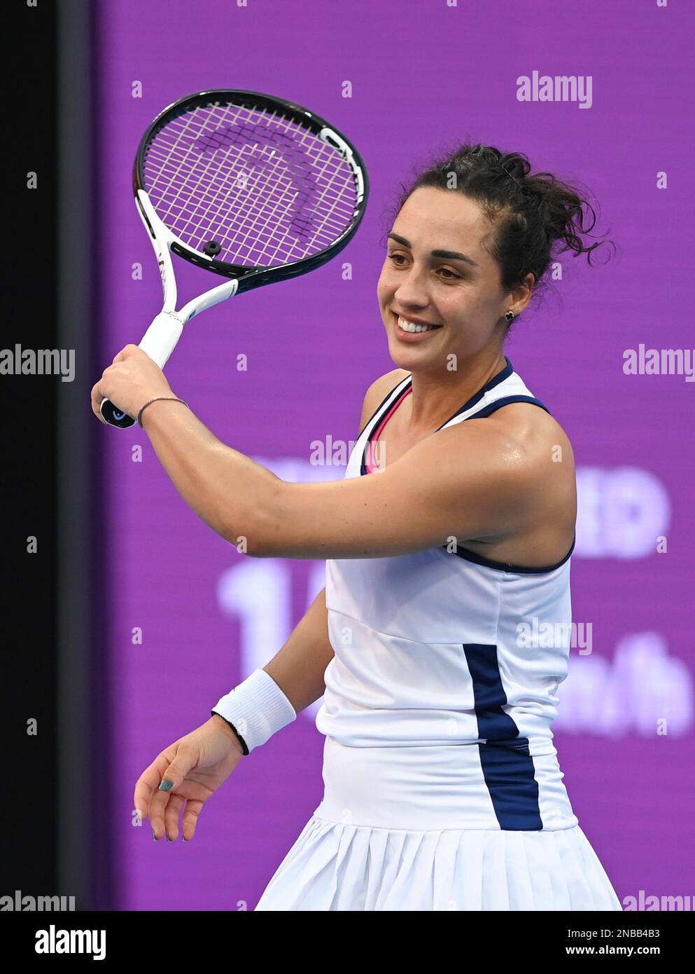 Doha, Qatar. 13th Feb, 2023. Martina Trevisan of Italy reacts during the singles round of 32 match against Karol¨ªna Muchova of the Czech Republic at WTA500 Qatar Open 2023 in Doha, Qatar, Feb. 13, 2023. Credit: Nikku/Xinhua/Alamy Live News Stock Photo