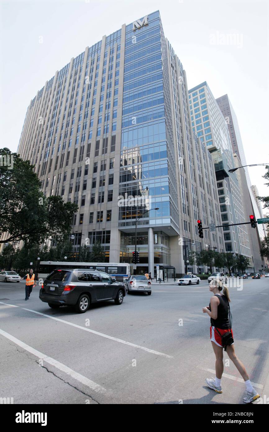 A pedestrian walks past Prentice Women&rsquo;s Hospital, Tuesday, Aug 