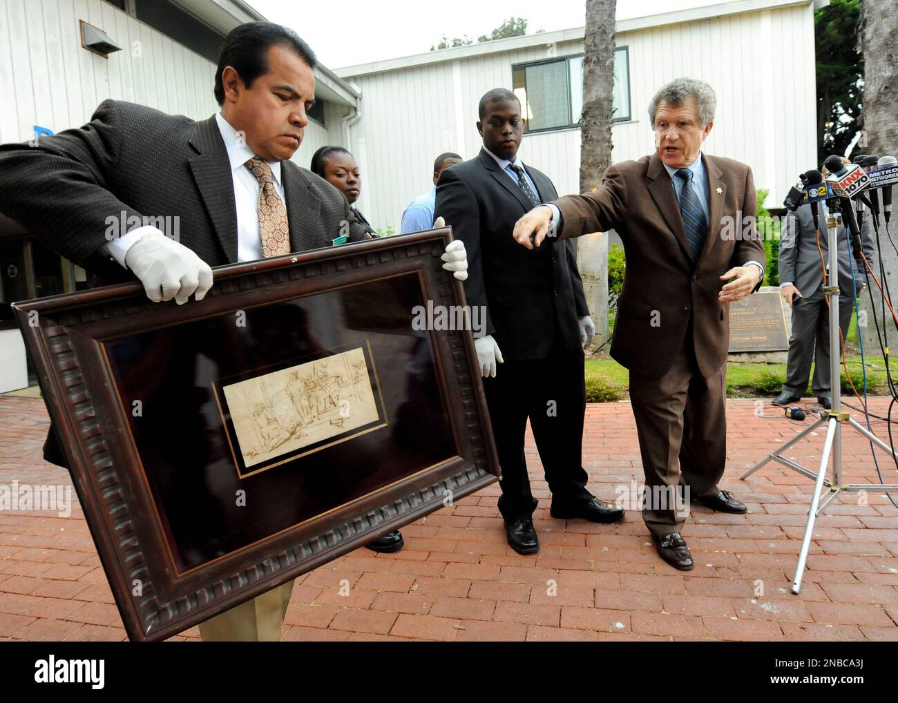 From left, Los Angeles Sheriff detective Estevan Martinez, LASD lead detective Clarence Williams