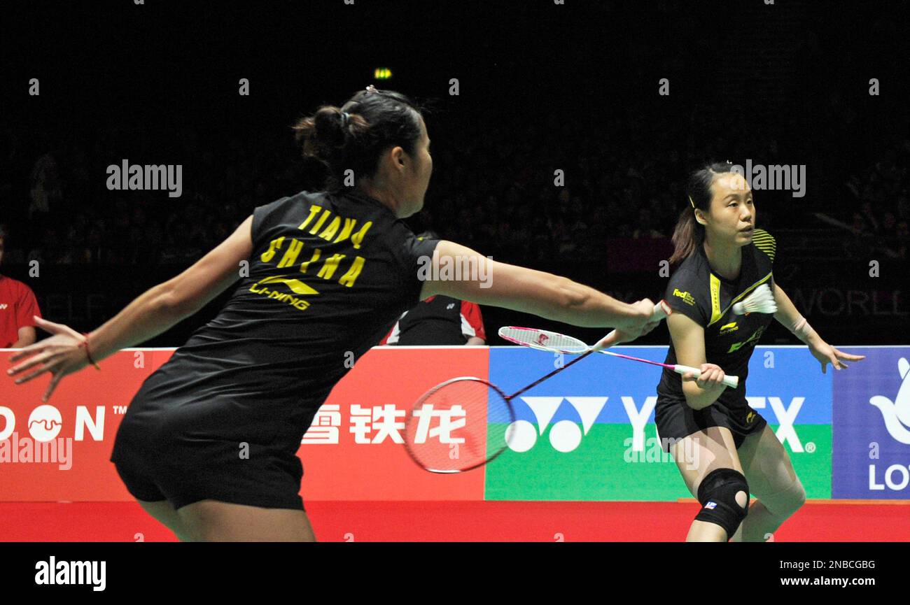 China's Qing Tian, left, and Yunlei Zhao, right, return a shot to China ...