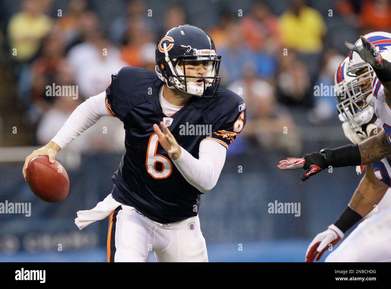 Chicago Bears quarterback Jay Cutler (6) scrambles from Buffalo Bills
