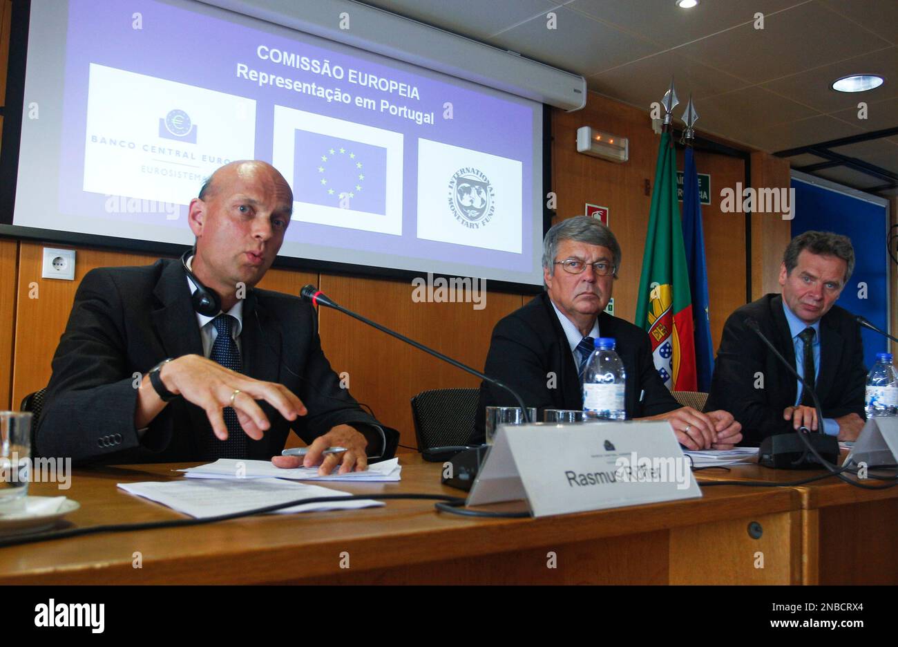 Rasmus Ruffer, left, of the European Central Bank, gestures during a ...
