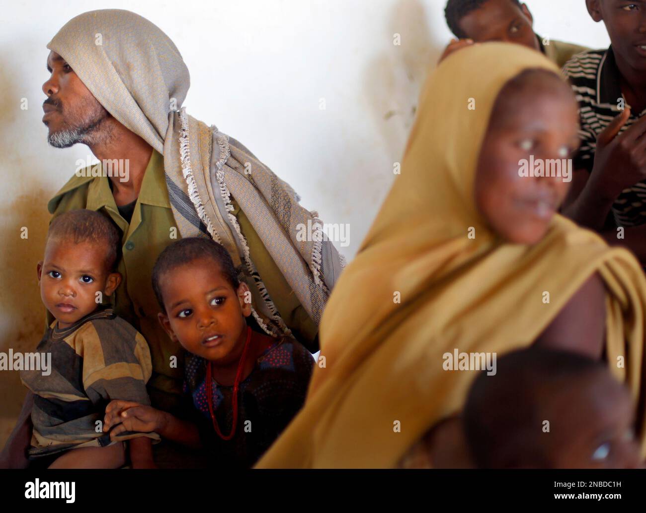 Somali refugees wait to be processed at a UNHCR screening center