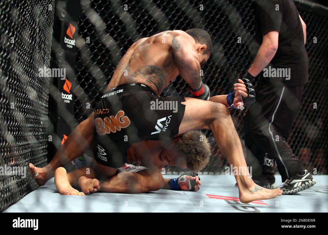 Victor Belfort, top, of Brazil, top, fights against Yoshihiro Akiyama, of  Japan, during their UFC middleweight fight at the Wells Fargo Center in  Philadelphia, Saturday, August 6, 2011. Belfort won via first-round