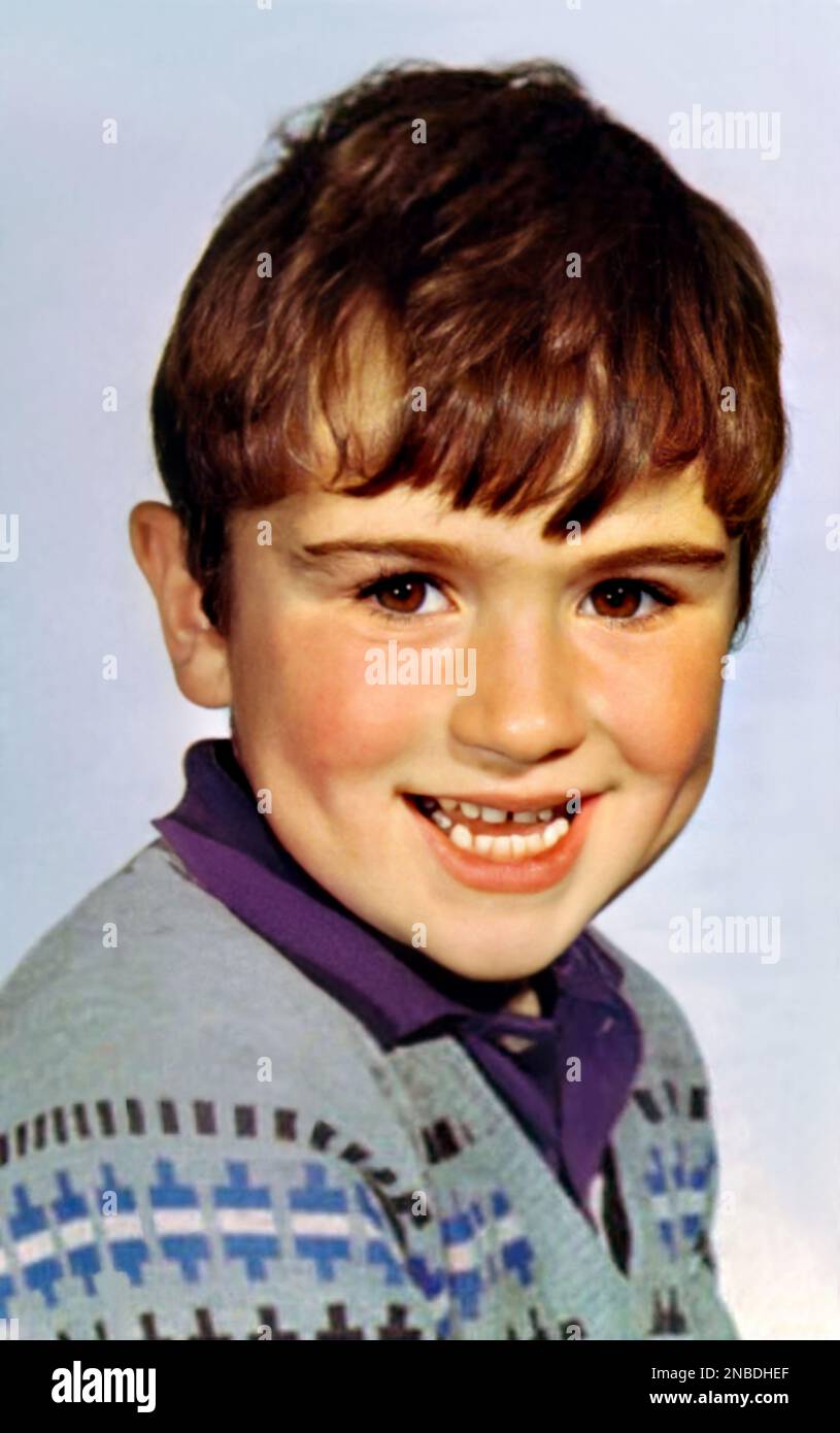 1968 , GREAT BRITAIN : The celebrated british Pop Star singer and composer GEORGE MICHAEL (  Georgios Kyriacos Panayiotou , 1963 - 2016 ) when was a young boy aged 5 . Unknown photographer. - HISTORY - FOTO STORICHE - personalità da bambino bambini da giovane - personality personalities when was young - INFANZIA - CHILDHOOD - BABY - CHILDREN - CHILD - POP MUSIC - MUSICA - cantante - COMPOSITORE  --- ARCHIVIO GBB Stock Photo