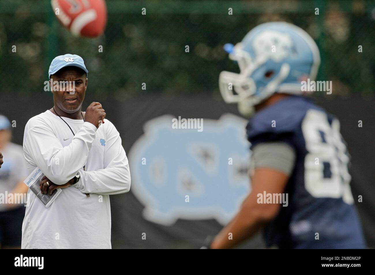 North Carolina football coach Everett Withers watches during the team's
