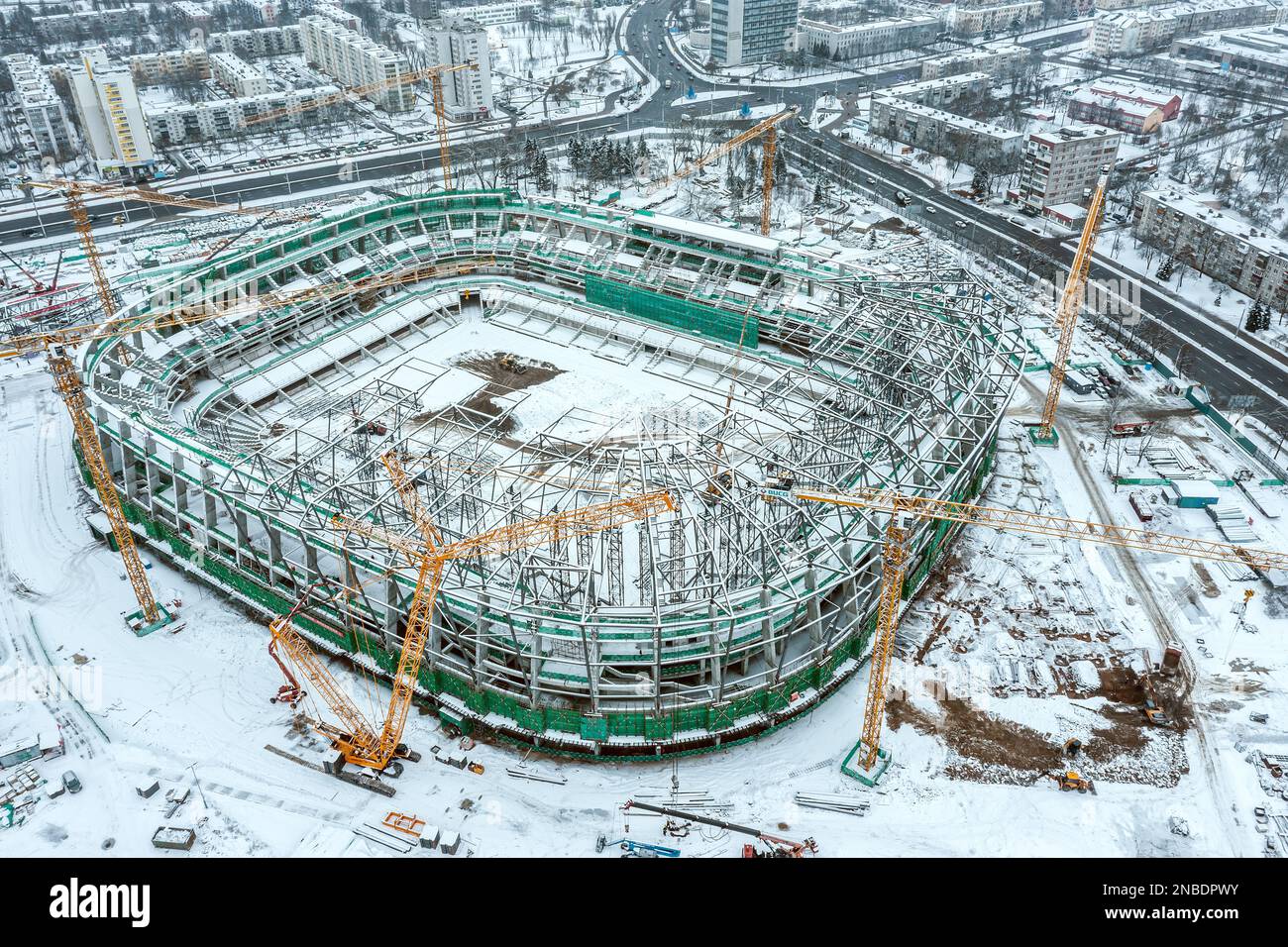 MINSK, BELARUS - 28 JANUARY, 2023: Construction site of the new football stadium in winter. Aerial photo. Stock Photo